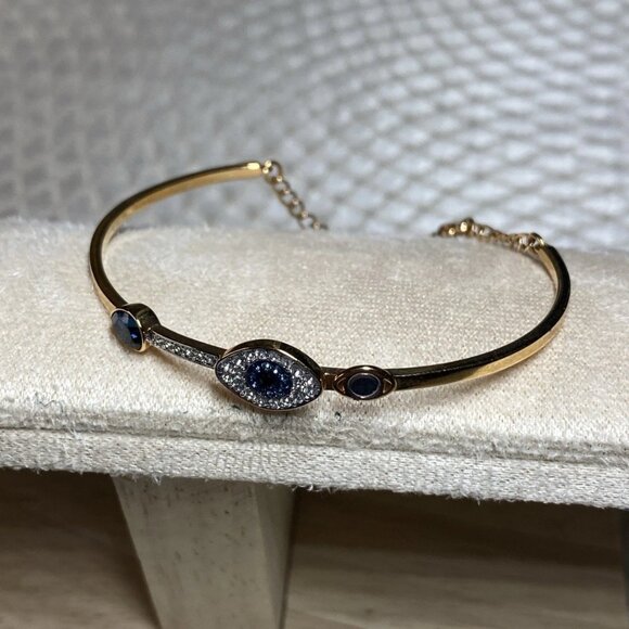 Swarovski Evil Eye Bangle Bracelet Gold-Tone Blue Crystal Small Swan Logo - Picture 1 of 13
